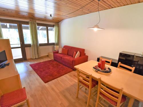 A seating area at Apartment Frassan by Interhome