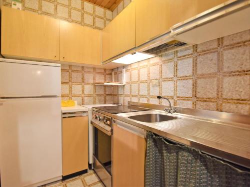 A kitchen or kitchenette at Apartment Frassan by Interhome