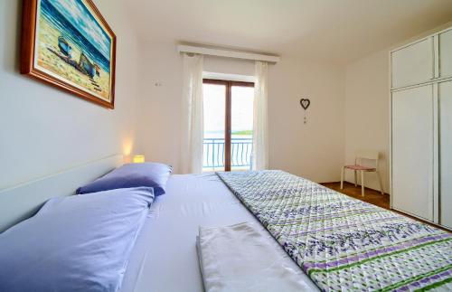 Ένα ή περισσότερα κρεβάτια σε δωμάτιο στο Apartments Dundo