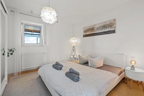 Voodi või voodid majutusasutuse TTP Apartment 6 Friedrichshafen toas