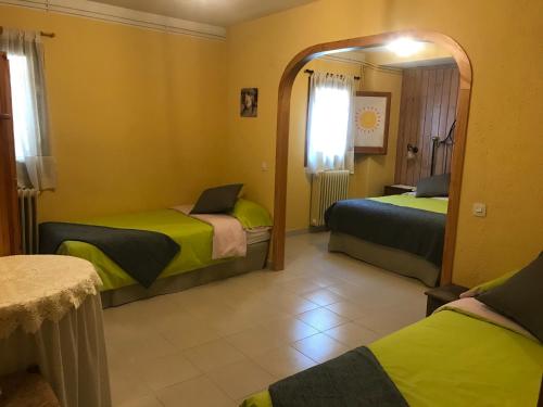 Posteľ alebo postele v izbe v ubytovaní Casa Rural Cal Farragetes