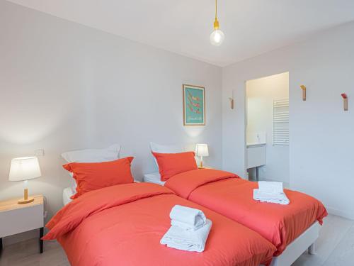 Ένα ή περισσότερα κρεβάτια σε δωμάτιο στο Holiday Home Le Ponant by Interhome