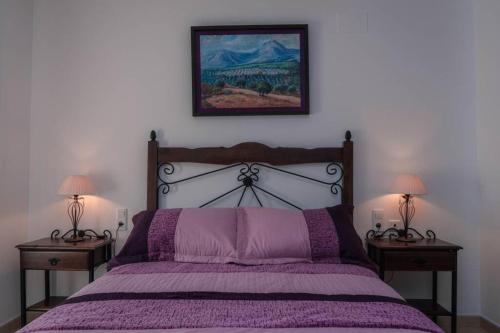 Postel nebo postele na pokoji v ubytování Casa Pepita Feria