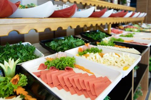 a buffet of food with vegetables on display at Buldum Otel in Ankara
