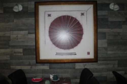 a picture on a wall with a picture on it at Kings Boutique Hotel in Blackpool