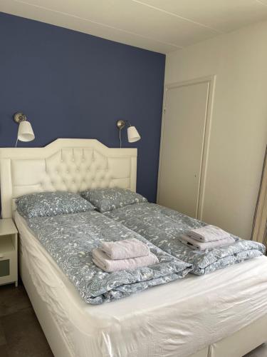 Ένα ή περισσότερα κρεβάτια σε δωμάτιο στο Dreamview Apartment