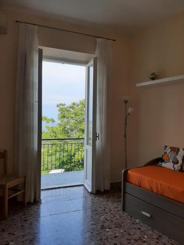 A bed or beds in a room at APPARTAMENTO CASA MARCO
