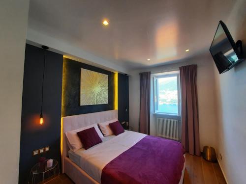Кровать или кровати в номере Le Luci sul Lago di Como