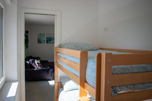 Ένα ή περισσότερα κρεβάτια σε δωμάτιο στο Apartmaji na placu