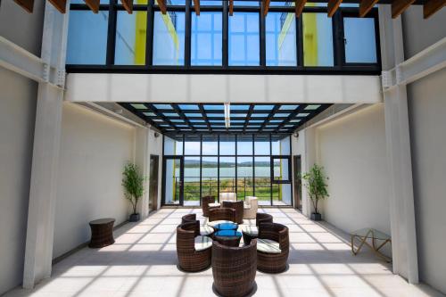 a view of a lobby with a large glass ceiling at Lovestar Lakeside Hotel - Starlight Building in Hengchun