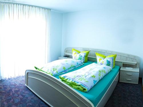 Postel nebo postele na pokoji v ubytování Landgasthaus Kaster