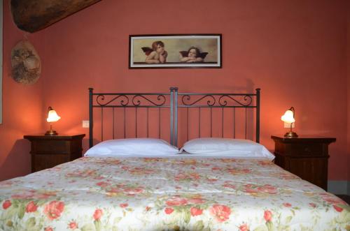 Кровать или кровати в номере Agriturismo Al Podere Di Rosa