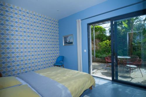 Cama o camas de una habitación en Bel Appart Style Vintage Vue Mer