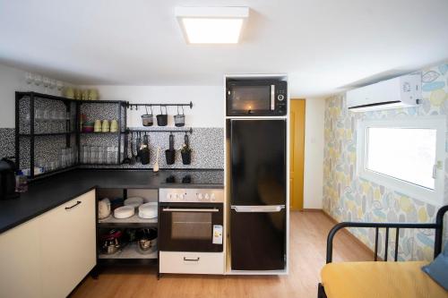 Η κουζίνα ή μικρή κουζίνα στο Mobilehome Szántód