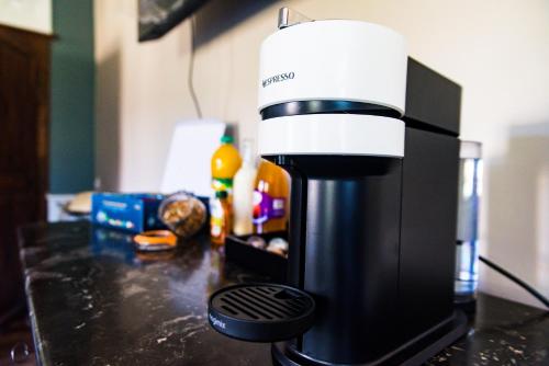 a coffee maker sitting on top of a counter at LE BAS CHITRAY in Ménil