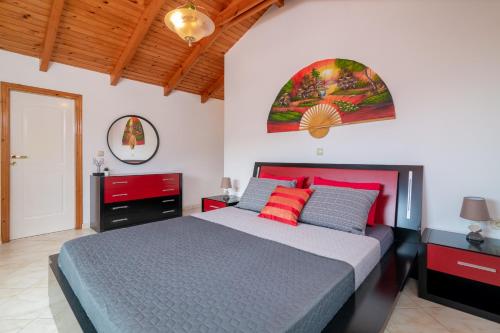 Postel nebo postele na pokoji v ubytování Avrochares Villa