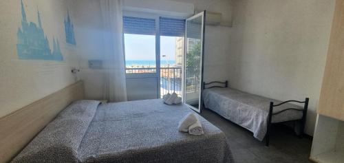 Postel nebo postele na pokoji v ubytování HOTEL VENUS
