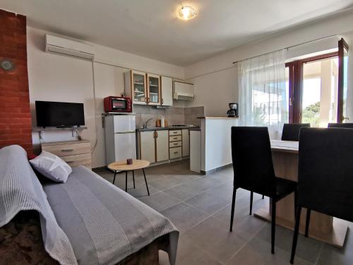 Kuchyň nebo kuchyňský kout v ubytování Apartment Hramina