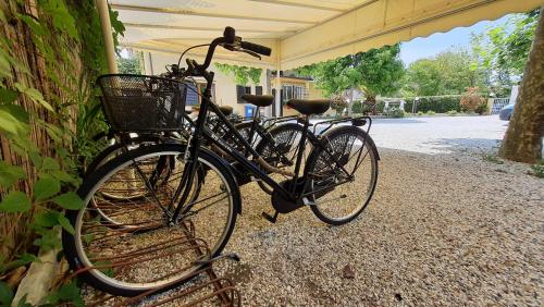 two bikes are parked next to a wall at Bed&Breakfast Villa Lorena in Forte dei Marmi