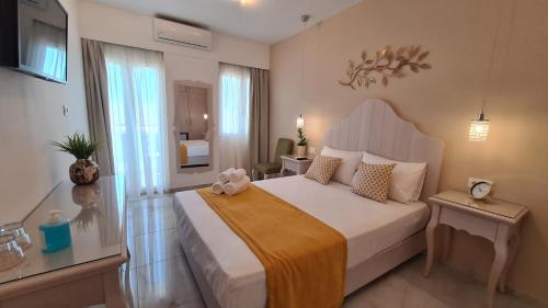 Postel nebo postele na pokoji v ubytování Elite Residence
