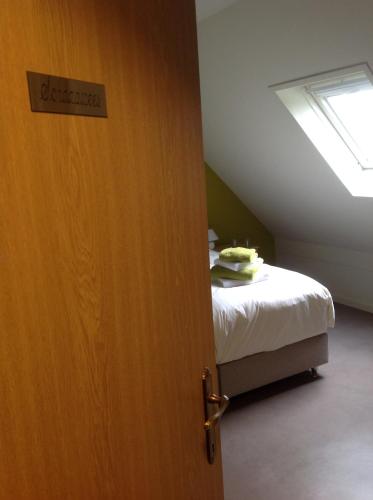 Cama o camas de una habitación en De Kempische Parel