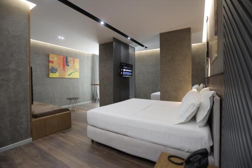 Postel nebo postele na pokoji v ubytování AP Hotel Boutique