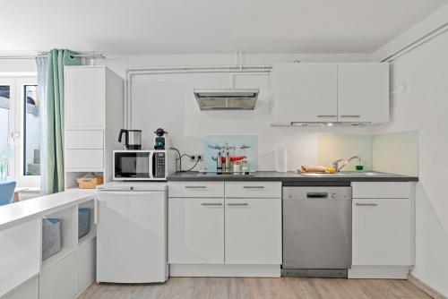Kuchyň nebo kuchyňský kout v ubytování TTP Apartments Immenstaad