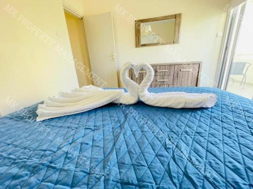 Milos City Center Apts No.34にあるベッド