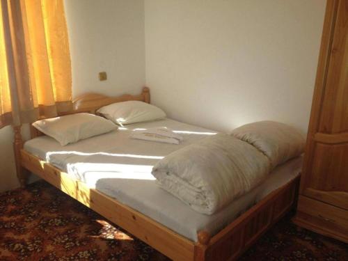 Posteľ alebo postele v izbe v ubytovaní Guest rooms Dyado Sabcho