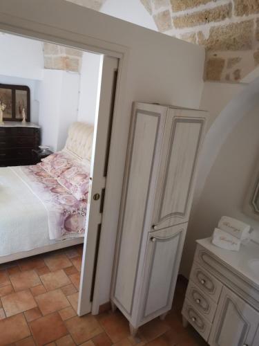 Una cama o camas en una habitación de B&B Prestige