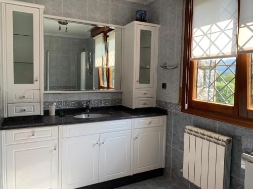 Et badeværelse på Alojamiento en CHIHUAHUA ETXEA