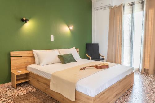 Postel nebo postele na pokoji v ubytování Lazaris Apartments
