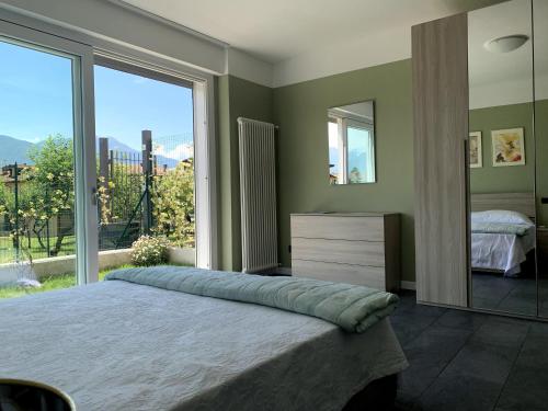 Postel nebo postele na pokoji v ubytování Casa Verde, Dongo, Lago di Como