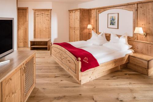 Ένα ή περισσότερα κρεβάτια σε δωμάτιο στο Hotel Saltauserhof