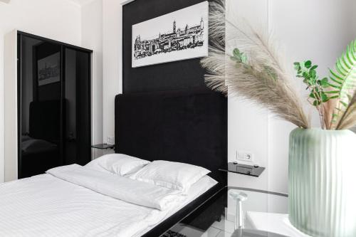 Katil atau katil-katil dalam bilik di LEOGRAND Apartments on Udatnogo 4-2