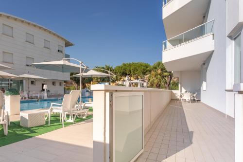 a balcony of a building with a swimming pool at Case vacanze Blue Bay Resort in Roseto degli Abruzzi
