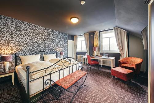 Ένα ή περισσότερα κρεβάτια σε δωμάτιο στο Hotel Alte Schule