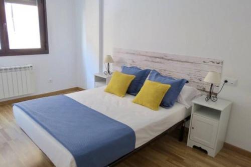 Postel nebo postele na pokoji v ubytování Apartamento Siente Sobrarbe en Aínsa