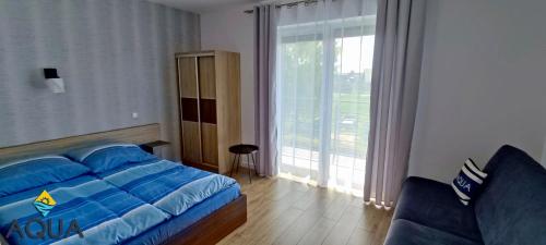 Posteľ alebo postele v izbe v ubytovaní Willa Aqua