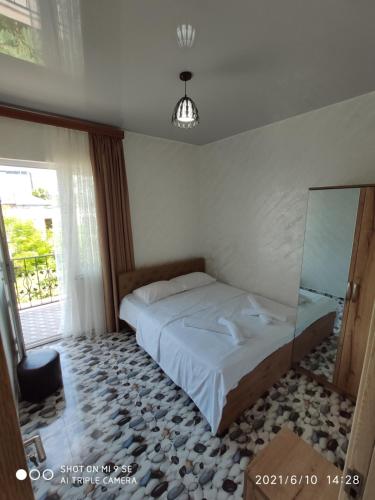 Ένα ή περισσότερα κρεβάτια σε δωμάτιο στο Kochalidze family