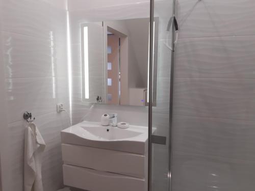 Kúpeľňa v ubytovaní Apartamenty przy Stoku Mrągowo