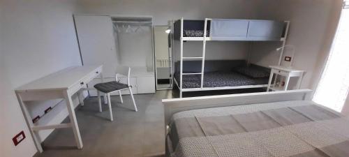 Postel nebo postele na pokoji v ubytování Al Cortile Tranquillo