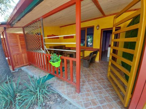 a porch of a house with a table at Villa art colony in Ohrid