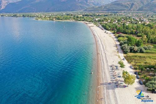 an aerial view of a beach and the ocean at Hotel Themisto in Nikolaíika