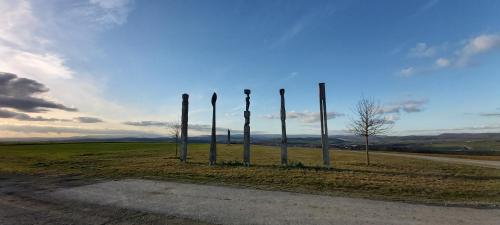 a row of poles on the side of a road at Apart of "MET" in Mellrichstadt