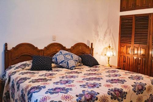 Voodi või voodid majutusasutuse Villa Flores, casa en el centro de Mascota toas