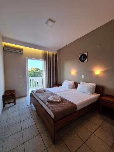 Postel nebo postele na pokoji v ubytování Abella Hotel