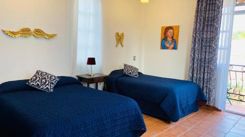 Ένα ή περισσότερα κρεβάτια σε δωμάτιο στο Villa Las Campanas