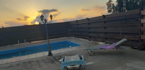 The swimming pool at or near Sunset Villa