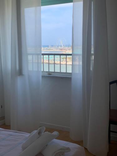 Ένα ή περισσότερα κρεβάτια σε δωμάτιο στο Hotel Laika